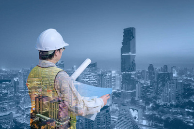 建筑师工作场所-建筑工具、 蓝图、 头盔、 卷尺、 建设理念。工程工具